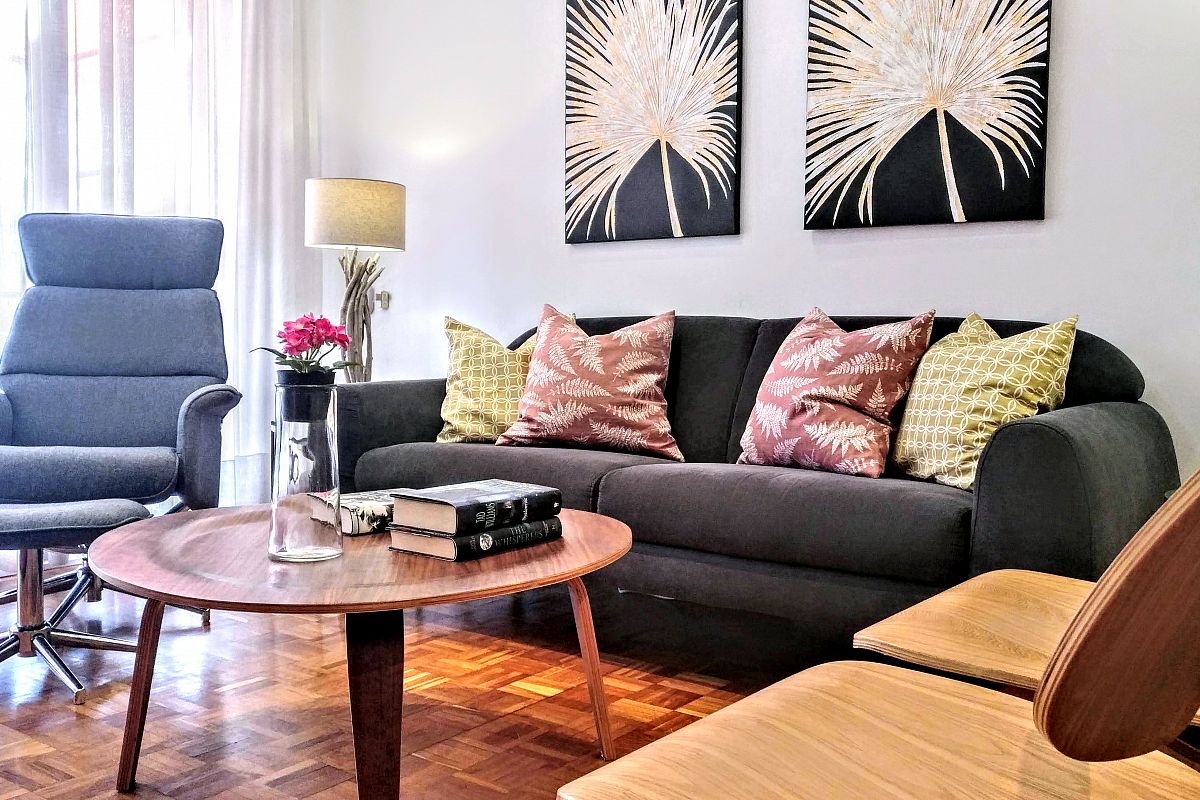 all the pieces of furniture are part of a well hand picked interior decoration in this amazing property for rent in Barcelona