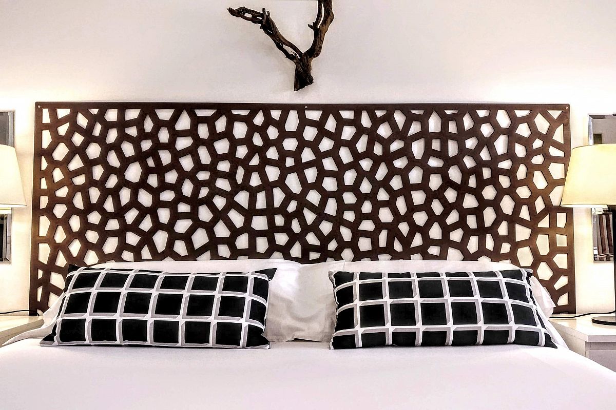 dramatic headboard detail fitting to perfection the bed cushions 