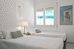 the second bedroom at the Garden House where all rooms face onto the terrace in this rental properties in Barcelona