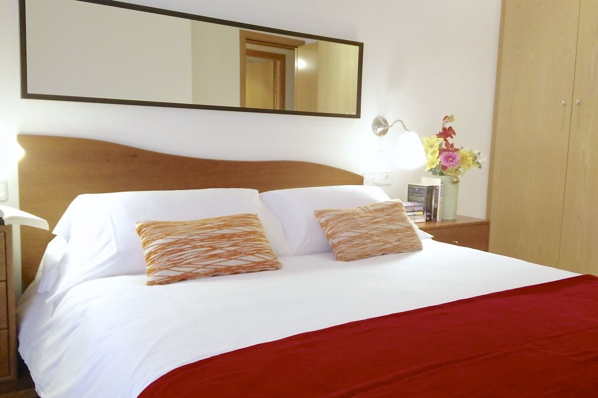 master bedroom at the Neo is one of the Barcelona apartments for rent short term for vacation getaways at bizflats.com
