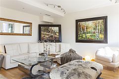 original pieces of furniture and oil paintings outstand in this lovely LaMimosa apartment in Eixample Barcelona