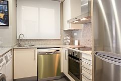 sleek modern fully equipped kitchen