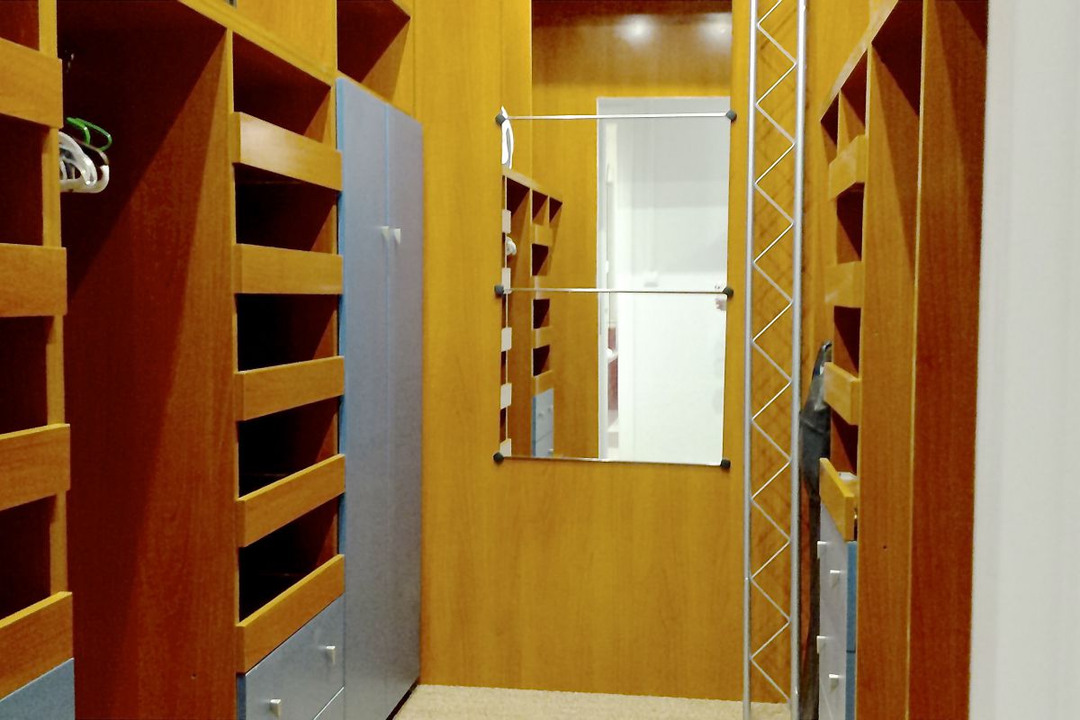large walk-in closet in the master bedroom