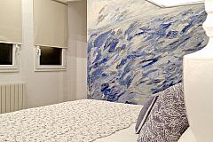 dramatic wall painted in shades of blue, memories of the Mediterranean sea present in the beaches of Barcelona
