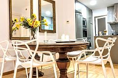 the dining area, is a winning mixture of styles at Parsifal La Rambla 3 bedroom monthly rental 