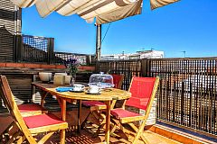 outdoors dining area at the Jollie penthouse apartment with Terrace in Les Corts Barcelona