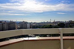 city view from the terrace of the Gatsby apartment in Barcelona for monthly rental, just a stroll away from the financial distric of Barcelona