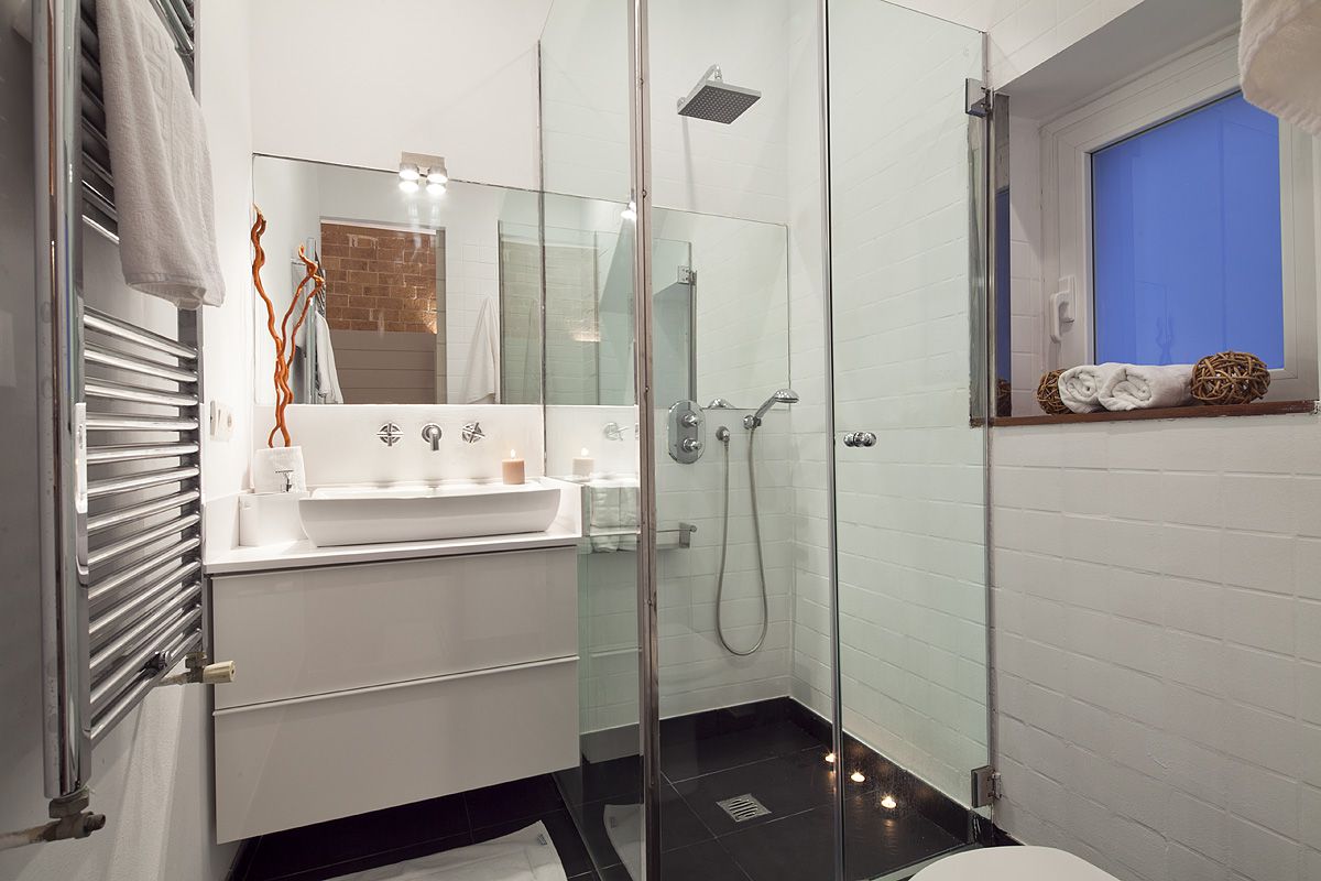 full master ensuite bathroom with a modern look, shower cabin and heated towel rail