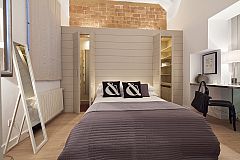 bedroom at the Gothic quarter historical center with private courtyard - Catedral apartment for rent in Barcelona corporate apartments for monthly rentals