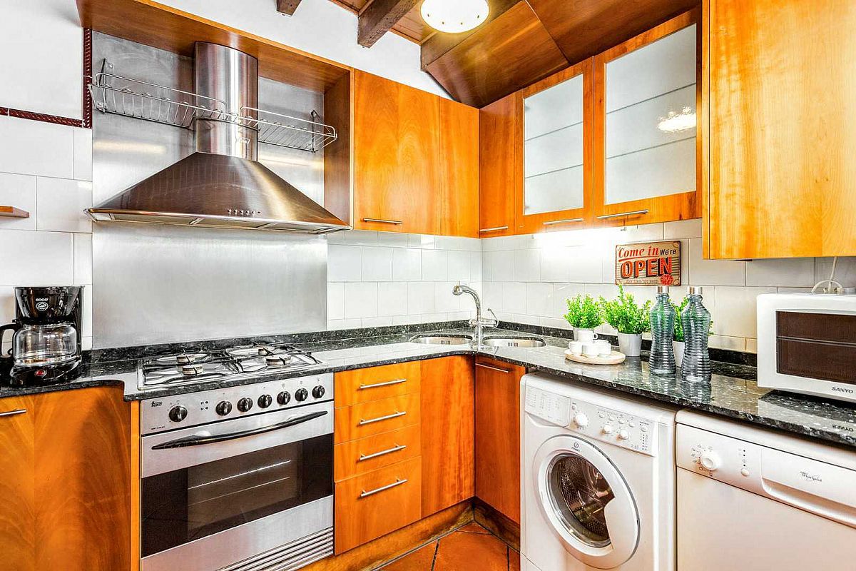 well equipped kitchen in this apartment with dishwasher, washer and dryer