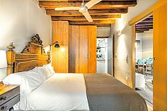 the ArtBlue penthouse master bedroom is ideal for family rentals in Barcelona